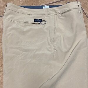Size 38 khaki shorts.  Water repellent.  4 way stretch.